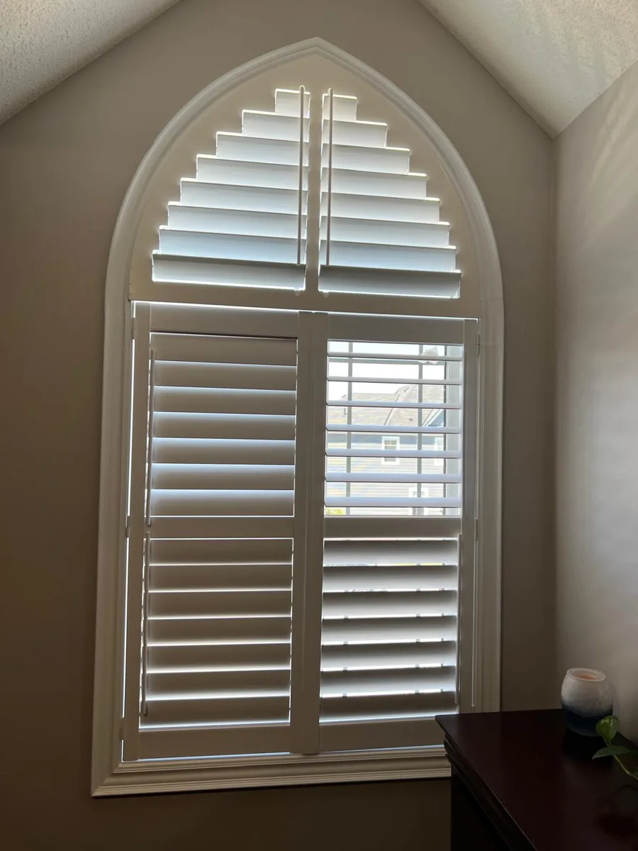 custom plantation shutters for an arched Woodbridge area window
