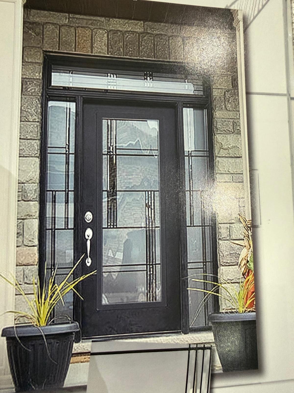 Aluminum storefront door installation by Star Window Fashion