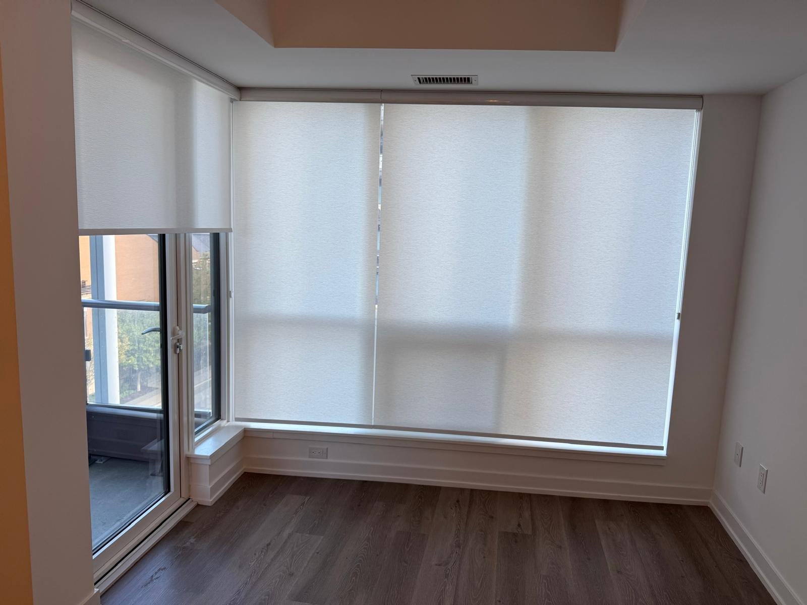 Toronto condo floor-to-ceiling roller shades installation